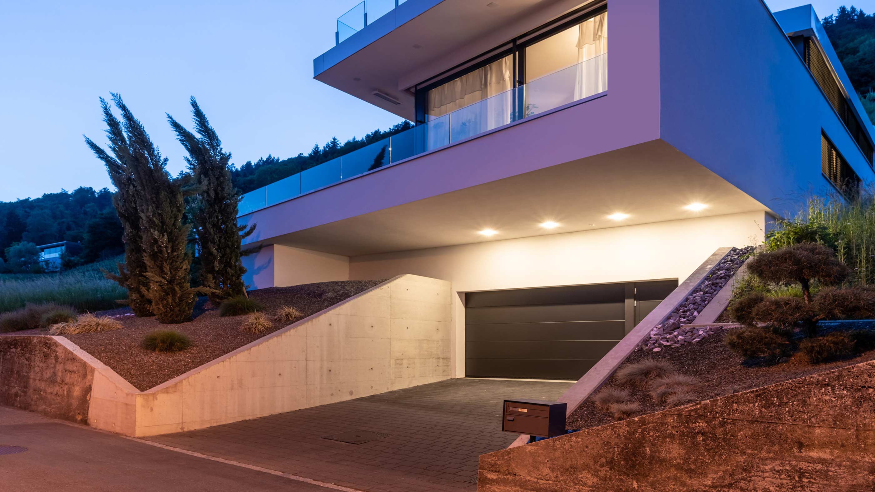 garage at dusk with lighting