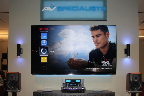 Close-up of Netflix menu on showroom TV under AV Specialists signage